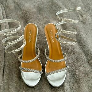 Platform, silver swirl detail heels. Worn once